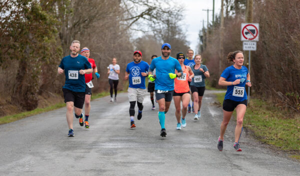 Harriers Pioneer 8k 2022 Running with Carlos. Photo by Joseph Camilleri