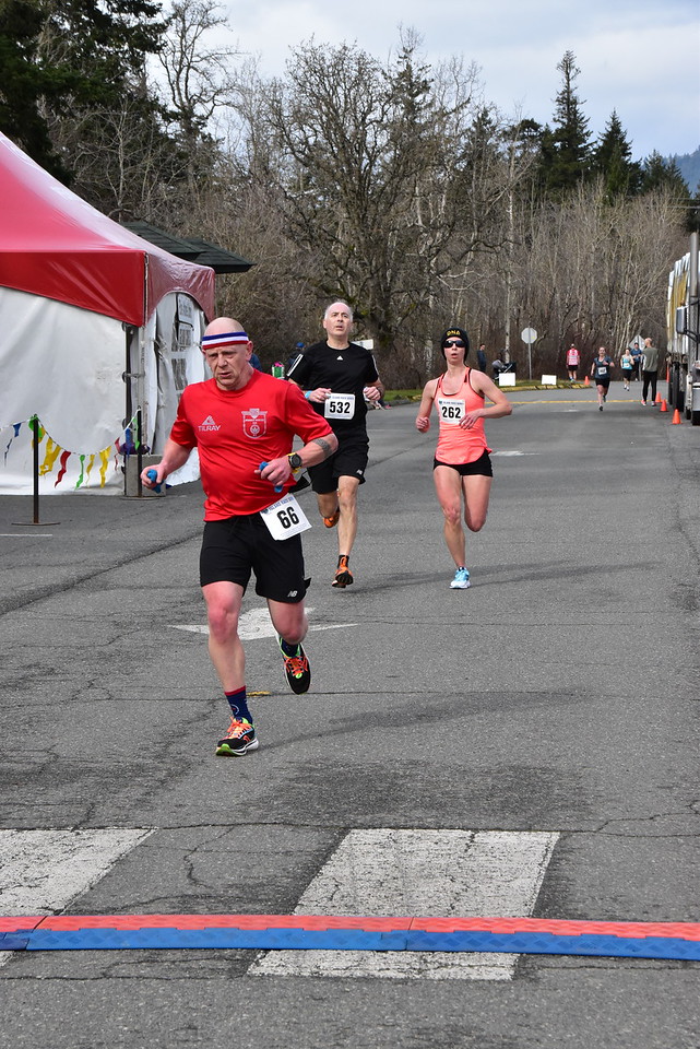 Approaching the finish line by Joseph Camilleri at the Harriers Pioneer 8k 2022.